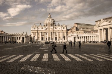 Vatican City, Vatican - February 13, 2018: Front view of St. Peters basilica from St. Peters square in morning light. clipart