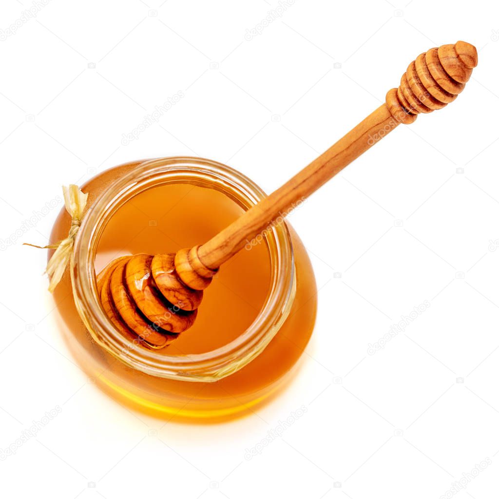 honey dipper and honey in jar isolated on white background. Sweet Natural bee Honey. Top view