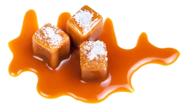 Caramel Candies Caramel Sauce Salt Crystals Top Isolated White Background — Stock Photo, Image