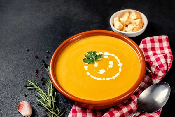 Spicy pumpkin cream soup with herbs — Stock Image Spicy Pumpkin Cream Soup Herbs Royalty Free Stock Images