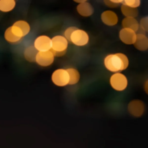 Zlatý Vánoční Bokeh Světla Černém Pozadí Abstraktní Žlutá Zářící Efocused — Stock fotografie