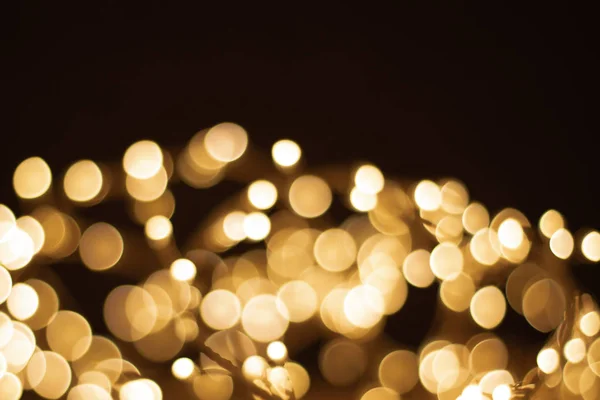 Luci Oro Natale Sfocate Sfondo Scuro Con Copyspace Luci Natale — Foto Stock