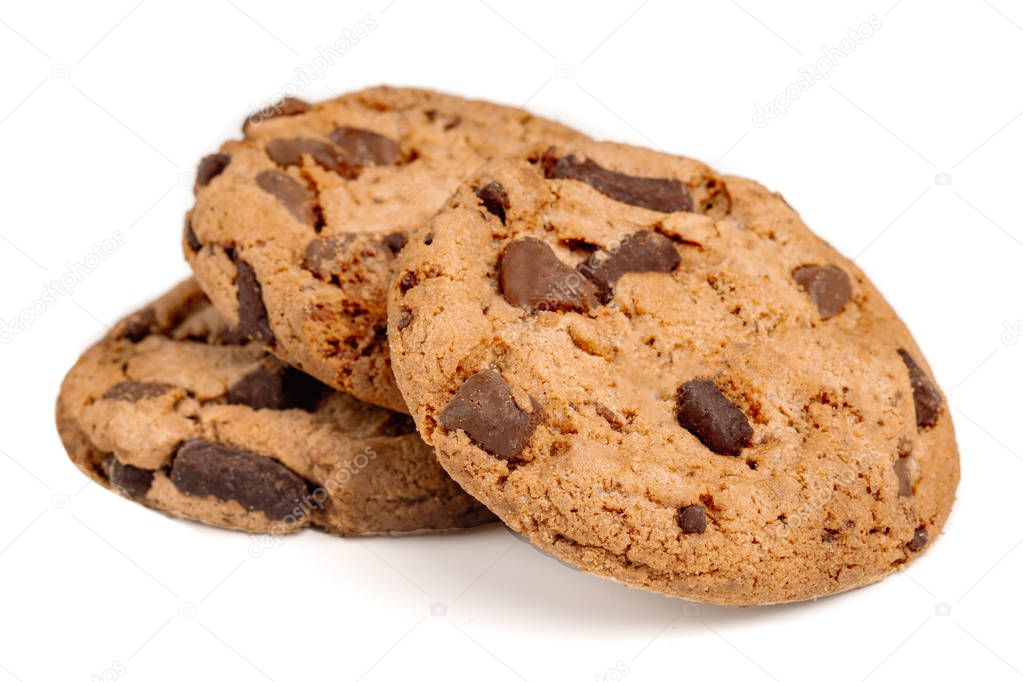 Chocolate chip cookies with chocolate pieces isolated on white background. Macro image