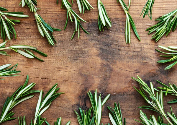 Frame Made Fresh Rosemary Herb Wooden Board Top View Copyspace — Stock Photo, Image