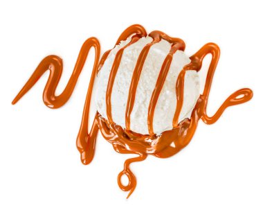 Vanilla Ice cream with pouring caramel sauce isolated on white background.  Top view clipart