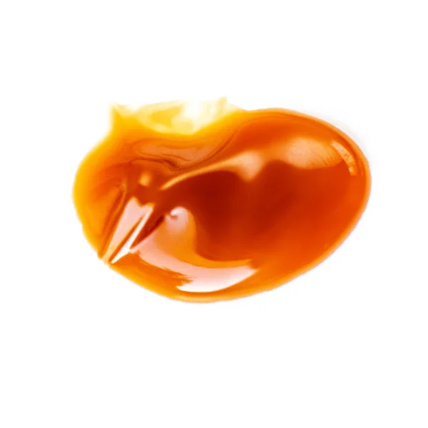 Caramel sauce isolated on white background. Flowing vanilla toff — Stock Photo, Image