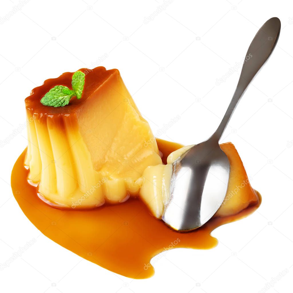 Caramel custard pudding with mint and caramel syrup isolated on 