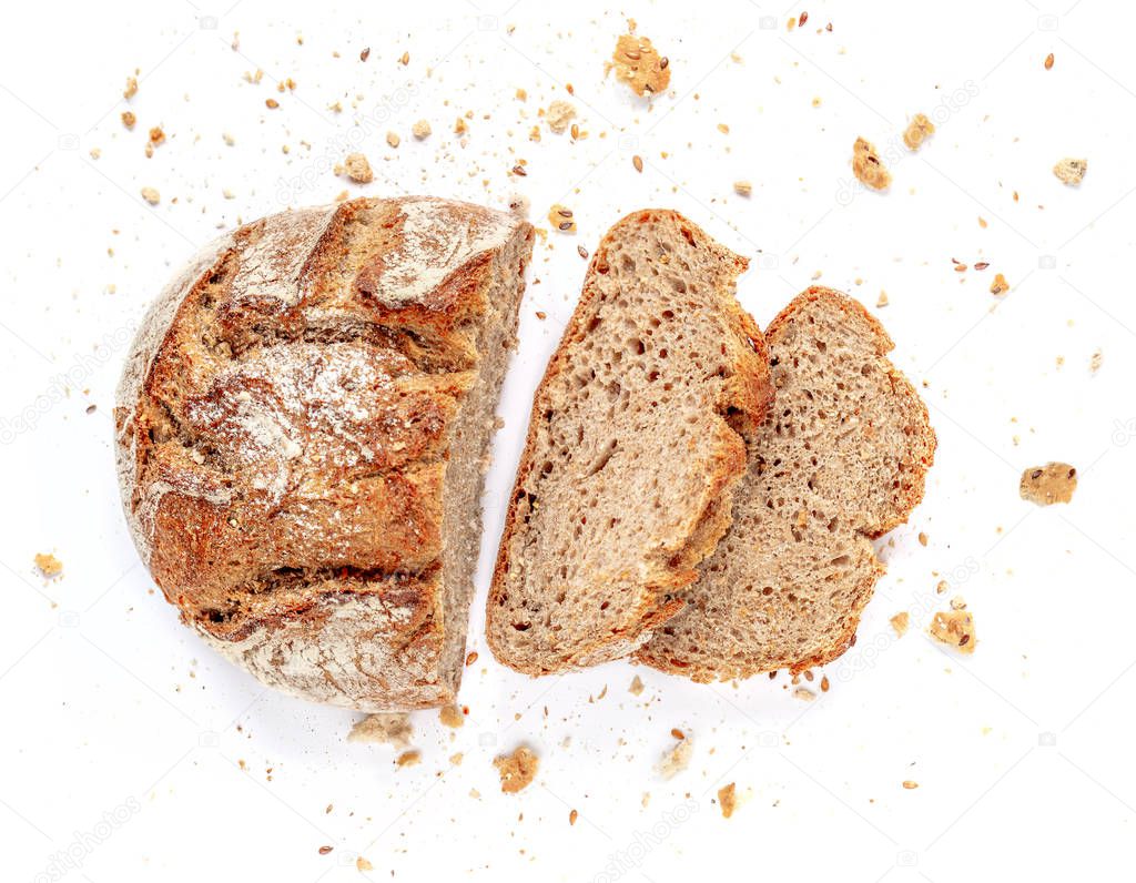 Sliced bread isolated on  white background. Crumbs and fresh Bre