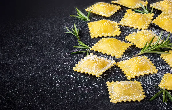 Fresh ravioli pasta  on dark background, top view.  Italian Ravi — Stock Photo, Image