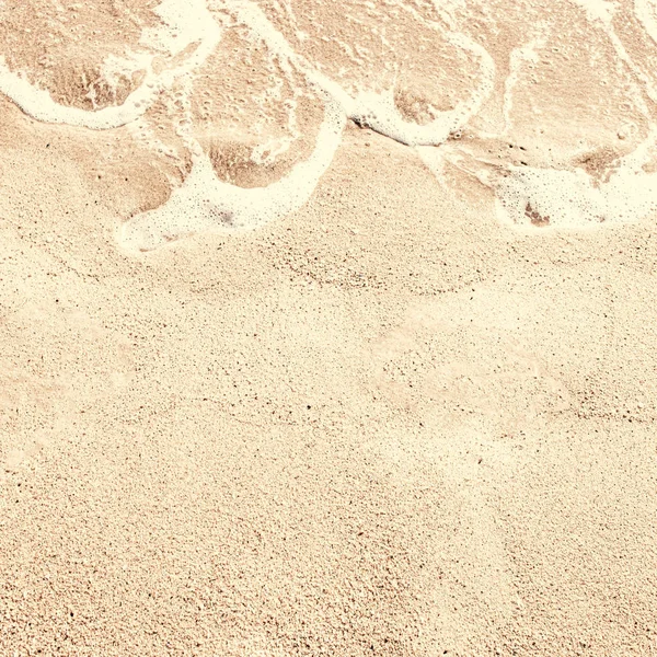 Sand textured  Background. Soft wave on sandy beach. Summer  Vac — Stock Photo, Image