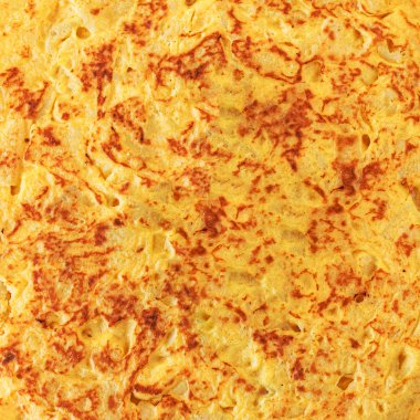 İspanyol omlet dokulu arka plan. Yumurta ile İspanyol mutfağı 