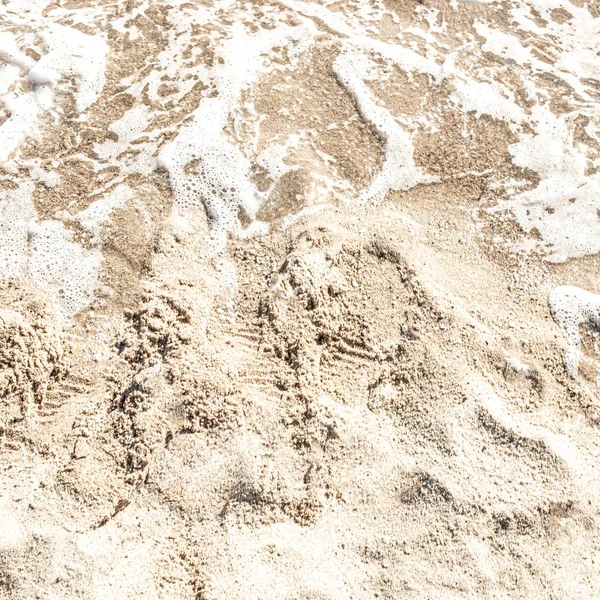 Písčité pozadí. Letní písečná pláž. Koncept dovolené — Stock fotografie