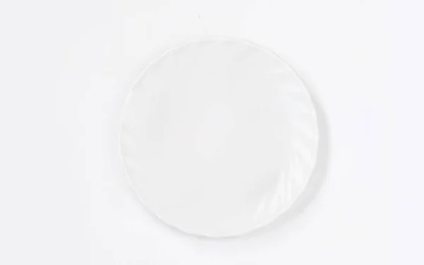 White plate on white background top view. Flat la — Stock Photo, Image