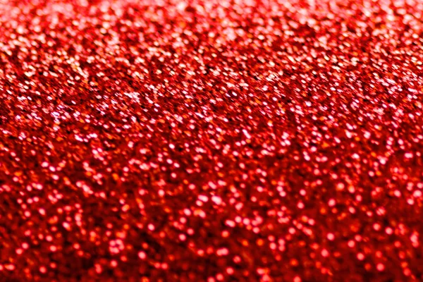 Abstract Christmas Background. Red glitter for greeting and wedd