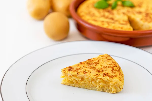 Piece of Omelet with eggs and potatoes isolated on white backgro — Stock Photo, Image