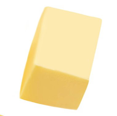 Beyaz arka planda izole edilmiş bir parça tereyağı. Dilimlenmiş Tereyağı bloğu yakın plan