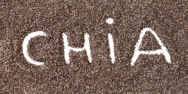Arka plan olarak chia tohumlarından yapılmış Chia kelimesi. Süper Yemek. Sağlıklı