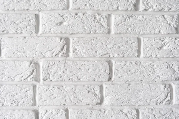 Fondo de pared de ladrillo blanco rugoso decorativo primer plano —  Fotos de Stock