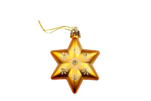 Orange star Christmas tree decoration with painted flowers and gold powder isolated on white background — Stock Photo, Image