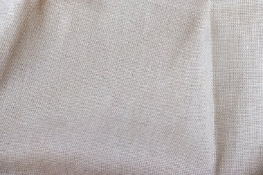Doğal bej kumaş dokusu. Pürüzlü çuval bezi arkaplanı