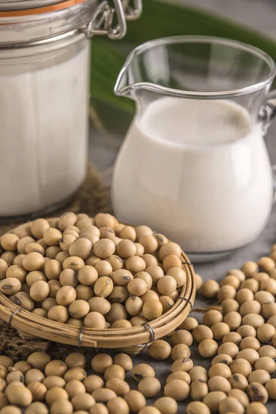 Close view of soybeans and milk in soft focus background