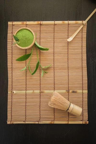 Top view of objects and goods for Organic Green Matcha Tea ceremony.