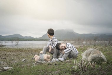 Teddy açık, Tayland ile Asya çocuk.