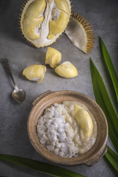 Food composition of Sweet Sticky Rice With Durian And Coconut Milk Sauce, Thai food.