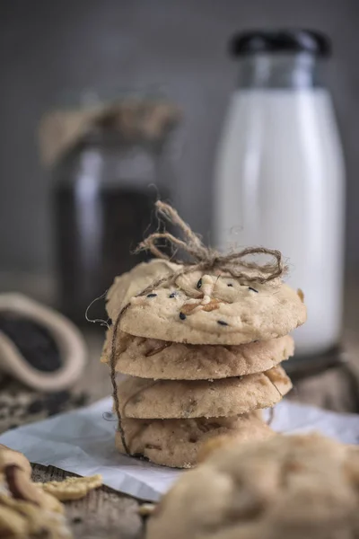 Food composition of cashew nuts cookies on rustic wooden table