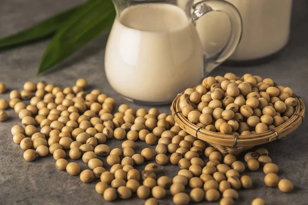 Soybeans and milk in soft focus background