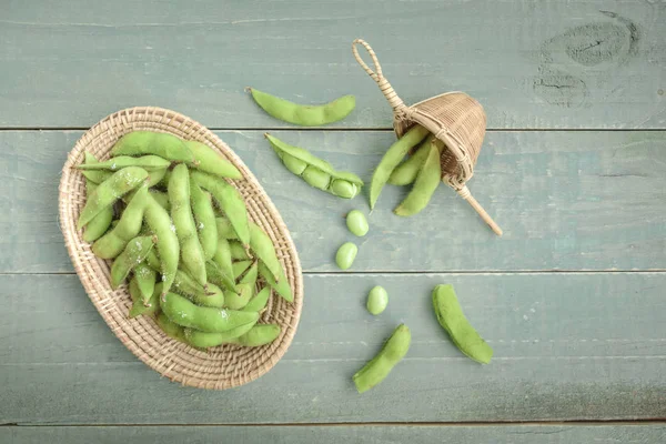 Green Japanese Soybean in wooden bowl on table wood — Stock Photo, Image