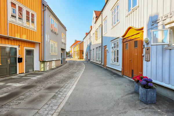 Trondheim, Norway, 05/29/2018 : Bakklandet , old neighbourhood in Trondheim, with small wooden houses and narrow streets. it is among the major tourist attractions in the city.