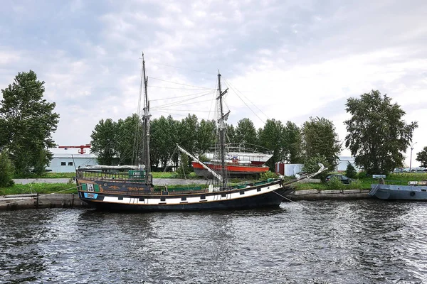 Wooden sailing ship is on the sea. Details and close-up. Sunny weather at sea.