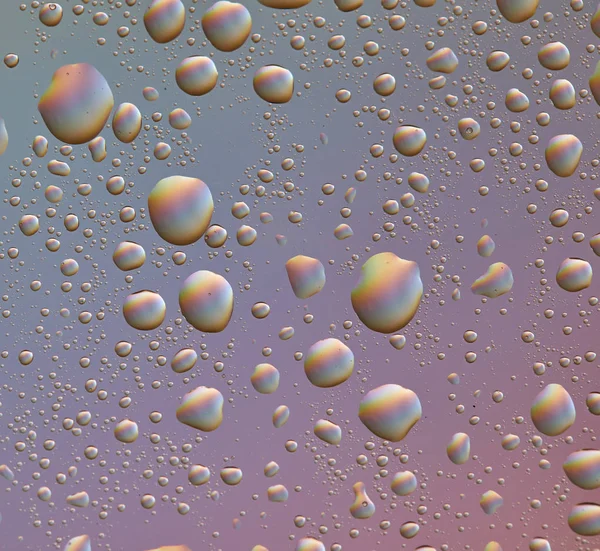 Droppar på glas av olika storlekar och färger på en färgad bakgrund, textur — Stockfoto