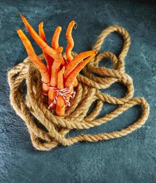 Ugly Food Deformed Organic Carrots Rope Blue Background Deformed Products — Stock Photo, Image