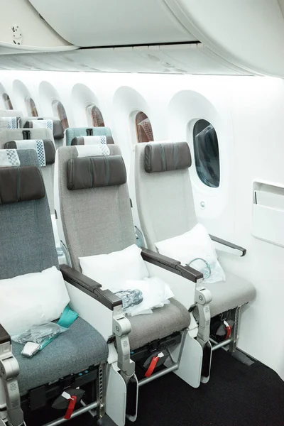Interior of an aircraft, economy class seats.