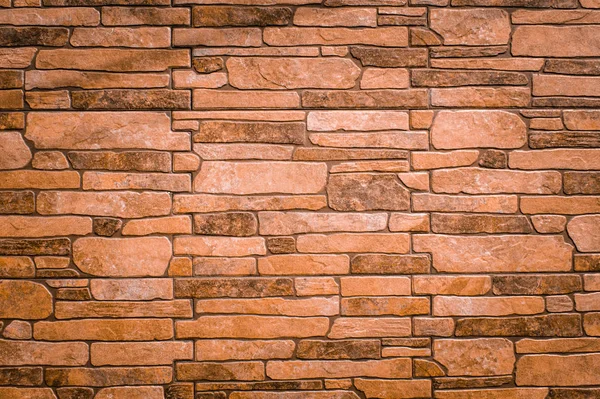 Textura texturizada de un viejo muro de piedra. Fondo de pantalla para fondo —  Fotos de Stock