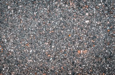 Küçük taşlar ile hafif pürüzsüz asfalt doku. Duvar kağıdı için