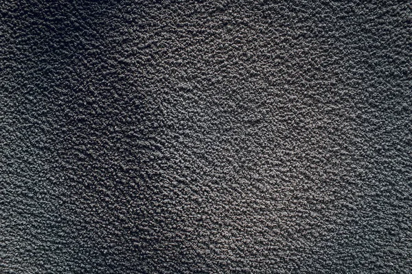 Textura negra de una vieja pared de hormigón gris. Fondo de cemento oscuro — Foto de Stock