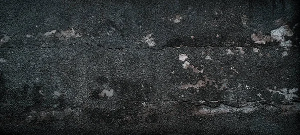 Czarna tekstura starej, szarej ściany betonowej. Tło z ciemnego cementu Obrazy Stockowe bez tantiem