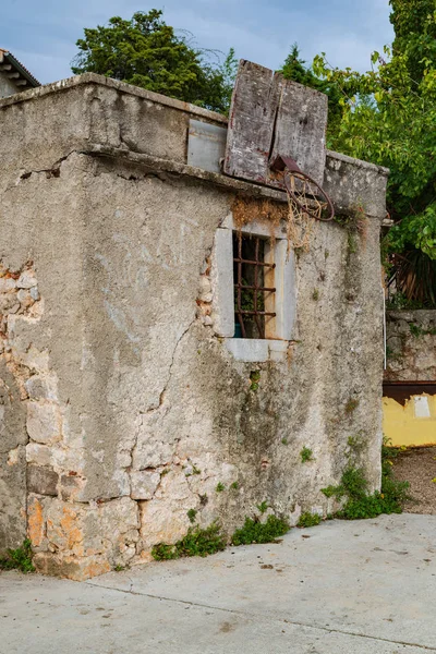 Vintage basketball hoop on old building