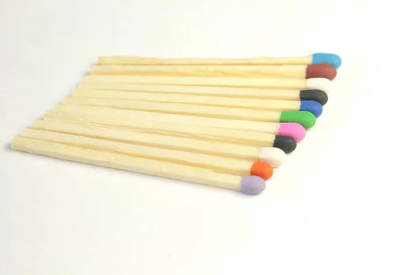 Even row of colorful matches isolated on white background — Stock Photo, Image