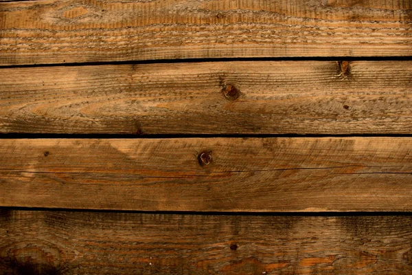 Dunkel rustikal braun Holz unebene Dielen flacher Hintergrund — Stockfoto