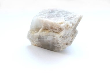 Beyaz arka plan üzerine izole dokulu ay taşı