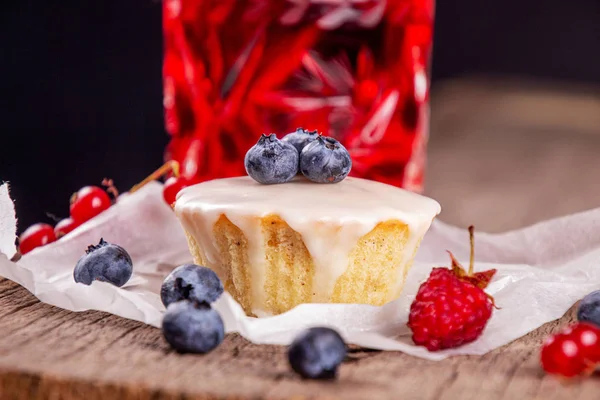 Muffin with berries^ blue berry, raspberry, red currant and glas