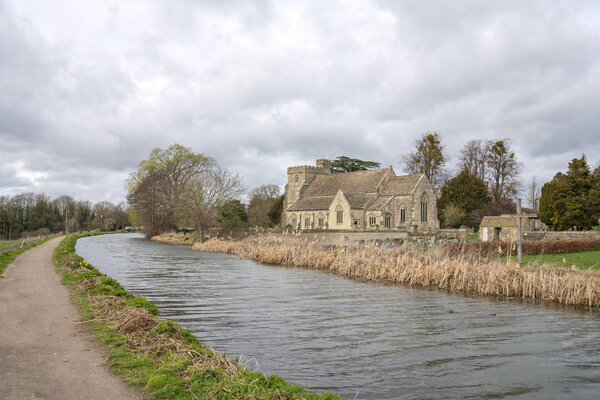 The Stroudwater Navigation with the Church of St Cyr, Stonehouse near Stroud, The Cotswolds, United Kingdom
