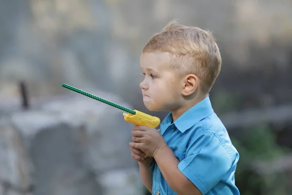 Little Boy Playing Yard Toy Weapon Child Plays Fantasizes Gets — Stock Photo, Image