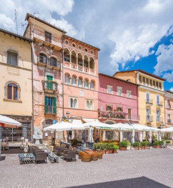 The colorful main square of Tagliacozzo in a summer morning, province of L'Aquila, Abruzzo, central Italy. clipart