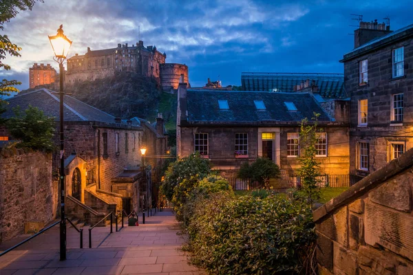 Scenic sight in Edinburgh at night with the Castle in the background. Scotland.
