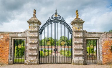 Ornate gate in the garden of Glamis Castle, in Angus, Scotland. clipart